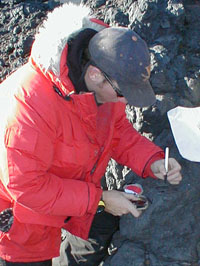 Jon Koenig marks a rock